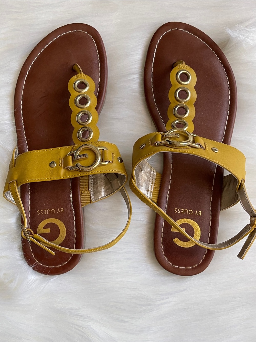 Guess by GUESS Women's Yellow gold Leather T-Strap Sandals